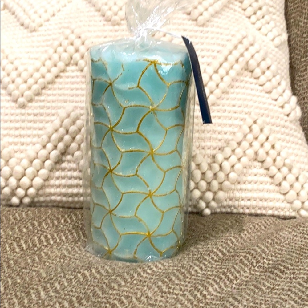 Abstract blue and gold candle